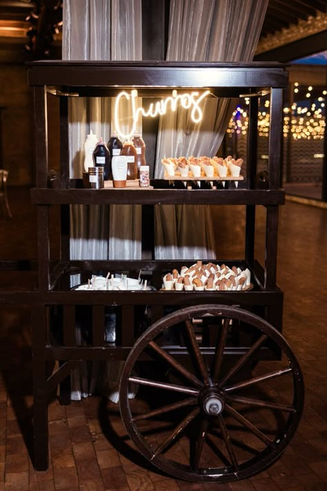 Churro cart at Rockwell on the River wedding reception Churros Wedding Dessert, Drinks Reception Ideas, Wedding Churro Station, Fun Wedding Reception Ideas Food Stations, Canape Wedding Reception, Churro Wedding Bar, Churro Station Wedding, Snack Cart Wedding, Churro Station