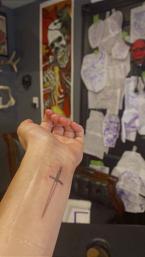 Matching Outline Tattoos, Small Dagger Tattoo Simple, Dagger Arm Tattoo, Cross Word Tattoo, Small Arm Tattoo Placement, Fine Line Dagger Tattoo, Cute Dagger Tattoo, Dagger Tattoo Placement, Crossed Swords Tattoo