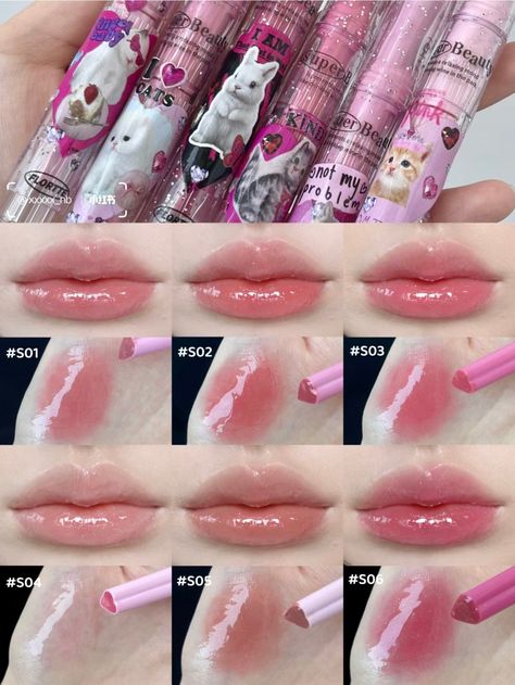 What it is: A lightweight and non-sticky crystal jelly lip balm. It melts directly on lips, and continuously moisturizes and plump lips even after repeated reapplications. New version with fine glitter for super glowy lips. (Old Versions) Size 1.5g FLT064 All-natural & cruelty-free Ingredients: Diisostearyl Malate, Bis-Behenyl Alcohol/Isostearyl Alcohol/Phytosterol Dipolylinoleyl Dipolylinoleate, Hydrogenated (Styrene/Methylstyrene/ indene) copolymer, cetyl ethylhexanoate, polyglyceryl-2 triisostearate, synthetic wax, silica dimethyl silylate, white beeswax , CI 77891, CI 77491, (Daily) Fragrance, Menthol, Tocopheryl Acetate, CI 77499, Menthol Lactate, Pentaerythritol Tetrabistert Butylhydroxyhydrocinnamate, CI 77492, Triethoxyoctylsilane Korean Lip Balm Products, Flortte Lip Gloss, Jelly Lips, Futuristic Makeup, Crystal Jelly, Korean Lips, Lip Jelly, Alat Makeup, Plump Lips