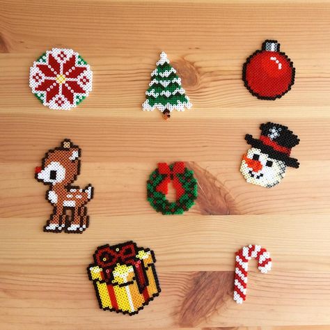 A bunch of small stuff for christmas cards and gift tags. Hama mini beads. . #fusebeads #beadsprite #beadart  #pixelart #hama #hamabeads #hamamini #perler #perlerbeads #bügelperlen #artkal #artkalbeads #nabbi #photopearls Stuff For Christmas, Perler Christmas, Hama Beads Christmas, Mini Hama Beads, Christmas Perler Beads, Hama Mini, Hamma Beads Ideas, Pearl Beads Pattern, Hama Beads Design