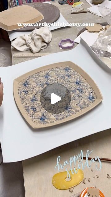 Elan Transfers on Instagram: "Have you used paper to mask shapes under your transfers? 🌼  We love how @artbyshirly used a paper flower cut out under our Hibiscus Transfers! Adding that little shape in the middle really brought this whole adorable set together! 💙  #elantransfers #dishset #hibiscus #ceramicdecals #pottery #functionalceramics #underglazetransfers #underglaze #céramique #wheelthrownpottery #ceramicdesign #potterymaking #potterywheel #potterytools #pottersofinstagram #potterylove #ceramicartist #potterystudio #madeinaskutt #potteryvideos #modernceramics #handbuiltpottery #graphicpots #wheelthrown #handmadepottery #potteryreel" Pottery Transfer Ideas, Surface Decorations, Flower Cut Out, Mask Shapes, Pottery Videos, Surface Decoration, Hand Built Pottery, Pottery Tools, Wheel Thrown Pottery