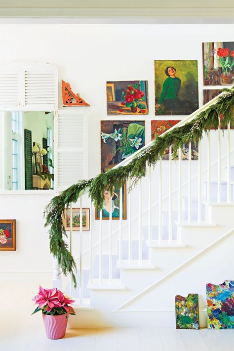 House Tour: A Colorful Cottage Christmas - Cottage style decorating, renovating and entertaining Ideas for indoors and out Alison Kandler, Winter Christmas Decorations, Indoor Outdoor Fireplace, Norfolk Pine Garland, Fireplace Winter, Outdoor Christmas Garland, Garland For Mantle, Cedar Garland, Indoor Outdoor Fireplaces