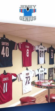 Football Jersey Display Ideas, Garage Games, Sports Jersey Display, Hockey Jersey Display, Framing Pictures, Basement Shop, Jersey Hanger, Bike Workshop, Display Hangers