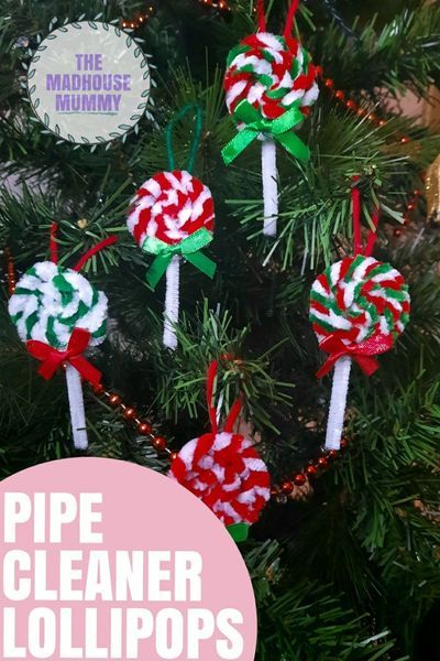 These adorable pipe cleaner lollipops are a fun and easy to learn handmade Christmas decoration craft for kids. These sweet diy ornaments look fab as handmade Christmas tree decorations and are perfect for a chocolate factory Christmas theme! Macaroon Ornaments Diy, Homemade Candy Christmas Ornaments, Lollipop Christmas Ornaments Diy, Peppermint Ornaments For Kids, Diy Christmas Candy Ornaments, Christmas Candy Ornaments Diy, Kid Christmas Crafts For Gifts, Christmas Crafts For Friends, Nutcracker Ornaments Diy