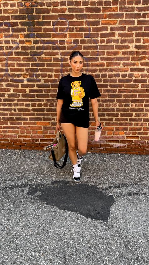 Streetwear for girls. Girl standing in front of brick wall. Wearing a shirt with a bear wearing a Lakers jersey. Concord 11 Outfit Women, Concord 11 Outfit, Concord 11s, Concord 11, Lakers Shirt, Outfit Women, Tshirt Dress, For Girls, Girl Outfits