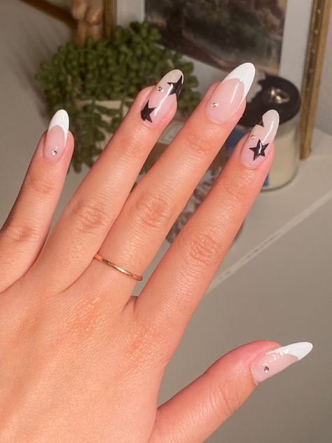 Nails With French Tip Design White, French Tip Acrylic Nails With Stars, Trendy Star Nails, Nail Design With Stars, Black French Tip Nails With Snowflakes, Almond French Tip Nails With Stars, French Tips Stars, French Tip Nails With Star Design, Nails With White Stars