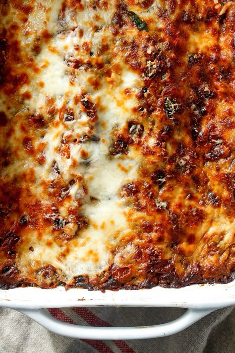 NYT Cooking: Equal parts indulgent and virtuous, this meatless lasagna from Mark Bittman will please everyone at the table. Serve it with a green salad on a weeknight, or alongside a platter of meatballs for Sunday dinner. And listen: We won't tell anyone if you use no-bake noodles or frozen spinach. It's all good either way. Suriname Recipes, Meatless Lasagna, Ny Times Recipes, Nyt Recipes, Mark Bittman, Spinach Lasagna, Nyt Cooking, Drying Pasta, Frozen Spinach