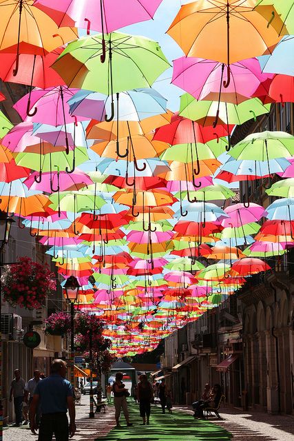 great party/wedding/shower idea: hanging colorful umbrellas; photographed by Patrícia Almeida