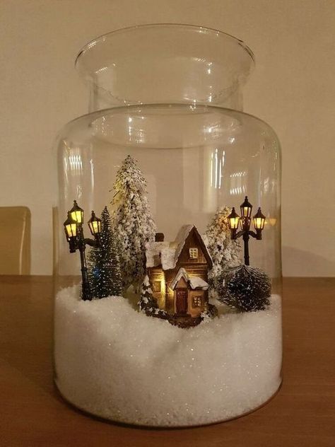 a jar with faux snow, a mini house, some bottle brush Christmas trees and street lights is an amazing Christmassy terrarium Appetizers Christmas, Christmas Vases, Bottle Brush Christmas Trees, Tree Themes, Christmas Decoration Ideas, Christmas Centerpieces Diy, White Christmas Trees, Christmas Jars, Merry Christmas Decoration