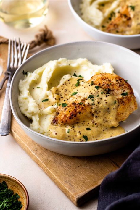 Chicken breasts smothered in the most insanely delicious dijon mustard cream sauce served over fluffy mashed potatoes. The chicken and sauce are all made in one skillet, making it an easy dinner. #creamsauce #dijonsauce #dijonmustard #skilletchicken #valentinesdaydinner #easydinner Chicken And Mashed Potatoes, Easy Chicken Breast, With Mashed Potatoes, Mashed Potato Recipes, Chicken Breast Recipes, Easy Chicken, Dijon, Chicken Dinner, Chicken Dishes