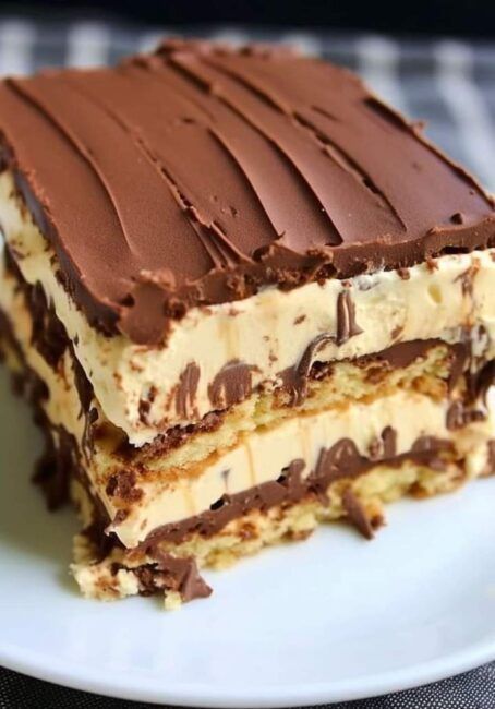 NO BAKE PEANUT BUTTER ECLAIR CAKE Peanut Butter Eclair Cake, Peanut Butter Eclair, Eclair Cake, No Bake Peanut Butter, Chocolate Graham Crackers, Caramel Apple Pie, Peanut Butter And Chocolate, Butter Recipes, Peanut Butter Recipes