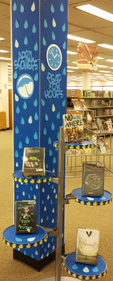 April Showers, Read For Hours - Library Display April Library Display Ideas, April Book Displays, Monthly Library Themes, Easter Library Displays, Library Display Ideas, Teen Library Displays, Library Signage, School Library Displays, Teen Library