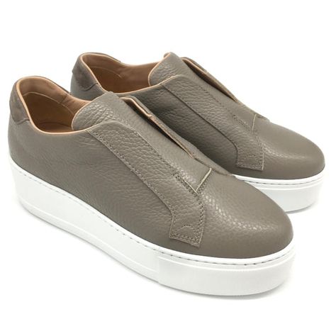 Slip on trainer with platform sole. 
Leather upper and leather lined. 
Available in black, navy, pink and taupe.