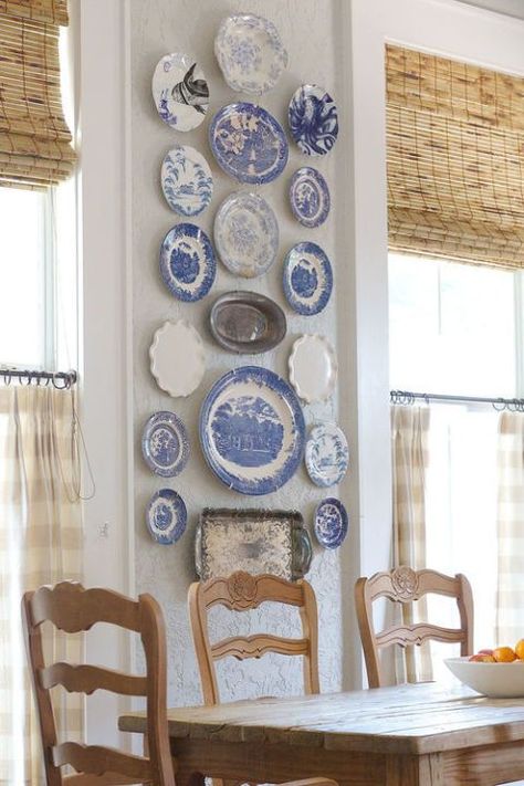 Decorative Plate Display:  Display your prized plates, just like Grandma did in her farmhouse. Plates On The Wall, French Provincial Kitchen, Blue And White Plates, Blue And White Chinoiserie, Blue White Decor, Plate Wall Decor, Plate Decor, Hanging Plates, Country French