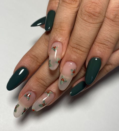 Red And Green Flower Nails, Simple Mistletoe Nails, Dark Green Nails Christmas, December Almond Nails, Dark Green Nails Designs, Dark Green Christmas Nails, Green Holiday Nails, Mistletoe Nails, Green Almond Nails