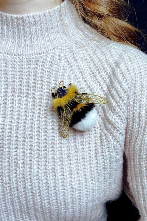 A cute brooch in the shape of a bee is a wonderful gift for a loved one. A bright bee-shaped bead accessory is always a pleasant surprise for a woman. The bee brooch is a symbol of hard work and perseverance. The bee brooch can be worn on a hat or dress. It will look really good. *** Brooches size 7 x 5 cm (2.76 x 1.97 inches) Cute Brooch, I Love Bees, Beaded Spiders, Bee Dress, Bee Pin, Bee Embroidery, Bee Jewelry, Bee Brooch, Insect Jewelry