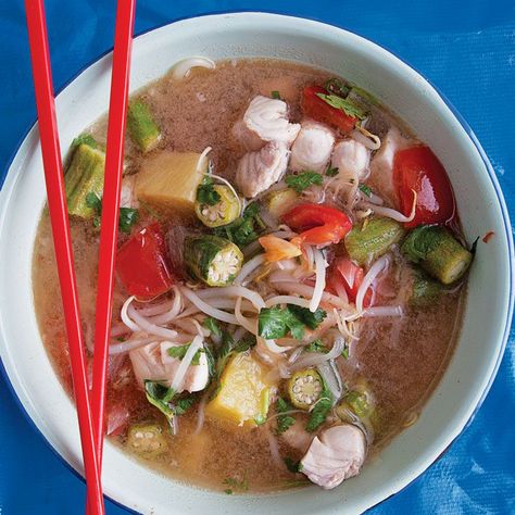 Canh Chua Cá (Sour Fish Soup) Recipe | Saveur Catfish Steaks, Sour Fish Soup, Vietnamese Pork Meatballs, Saveur Recipes, Vietnamese Foods, Canh Chua, Vietnamese Soup, Vibrant Food, Fish Soup