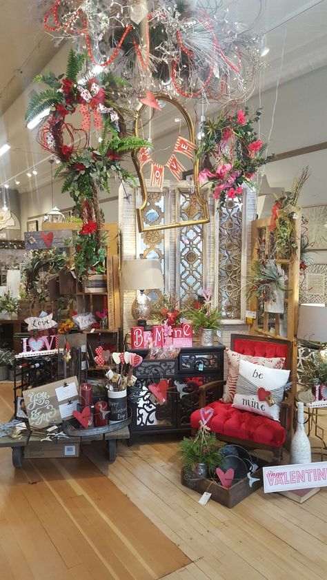 Valentines day decor display idea. Colorful vintage chair accents the theme well. @magnoliasne Whimsical Booth Display, Valentines Store Display, Valentine Booth Display Ideas, Valentine Display Ideas Retail, Valentine Window Display Ideas, Valentines Booth, Window Lounge, Florist Window Display, Valentines Creative