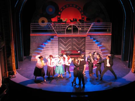 Grease set design - one main piece, changed with fly-ins, lights and props. Love that the floor is a record. Footloose Musical, Musical Set Design, Grease Costumes, Grease Is The Word, Grease Musical, Zombie Prom, Elementary Music Education, Paper Art Projects, Set Design Theatre