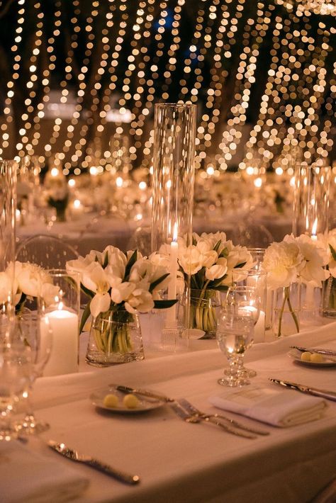 Simple Chic Centerpieces, White And Glass Wedding Decor, Tulip Decorations Wedding, White Tulip Table Decor, Tulips In Wedding, Orchid Flower Centerpieces, Wedding Decorations Tulips, White Flower Wedding Reception, Classic White Wedding Theme