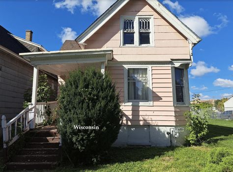 c.1897 Cheap House in Wisconsin Under $48K - Old Houses Under $100K Cheap House, Cheap Houses, Detached Garage, Old Houses, Estate Agent, Real Estate Agent, Front Porch, Wisconsin, Hardwood Floors