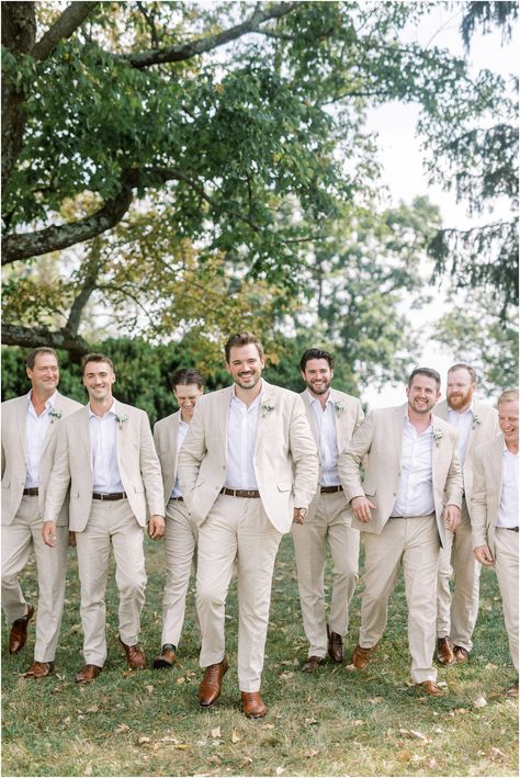 Relaxed, classic groomsmen attire for a summer wedding. Beige suites and white shirts with brown shoes-the perfect combination! Wedding Inspiration for the groom. #groomsuit #beigesuit #groomstyle #groomsmensuits Pale Yellow Groomsmen Attire, Light Khaki Groomsmen Attire, Khaki Suit Groomsmen, Khaki Mens Wedding Attire, Groomsmen Attire Light Brown, Groomsmen Attire Cream Suits, Light Beige Groomsmen Suits, Oatmeal Suit Wedding, Groomsmen Suits Beige