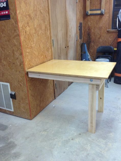 Ahhh! My shop is on it’s way to becoming functional! I still have plenty of projects to go, but at least one more is off the list. Take a look and let me know what you think of my fold down w… Woodworking Space, Work Garage, Workbench Table, Building A Workbench, Folding Workbench, Fold Down Table, Drop Down Table, Diy Workbench, Interior Vintage