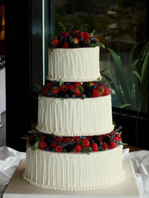 Buttercream and fresh fruit wedding cake Fruit Cake For Wedding, Fruit On Wedding Cake, Wedding Cake Fresh Fruit, Wedding Cake With Fresh Fruit, Wedding Cake Tres Leches, Fruit Topped Wedding Cake, German Wedding Cake, Huckleberry Wedding Cake, Wedding Cakes Strawberries