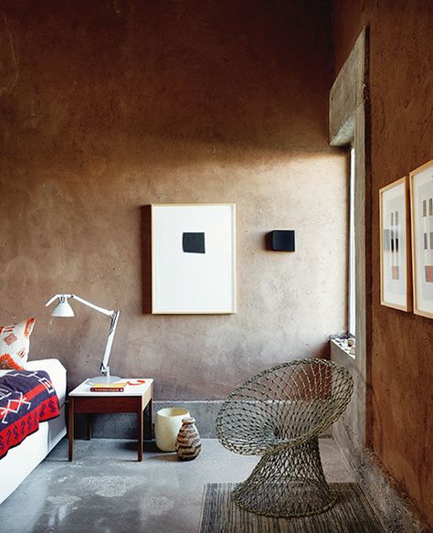 The new book Marfa Modern: Artistic Interiors of the West Texas High Desert — written by Helen Thompson with photographs by Casey Dunn — brings together 21 artfully minimalist homes. Architect Ron Rael placed the window in a bedroom of the Box Box house to catch early morning light. Marfa Modern, Cinder Block Walls, Walled Courtyard, Minimalist Artist, Donald Judd, Plywood Flooring, Feel Something, Property Design, High Desert