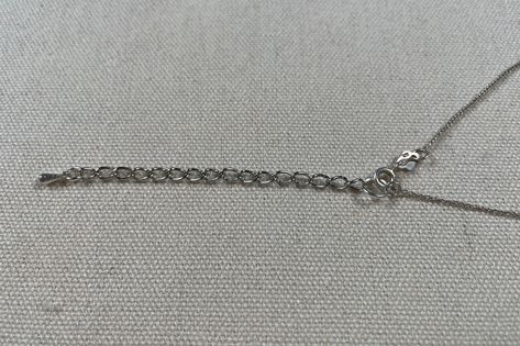 How to Add an Extender Chain to a Necklace - Living a Real Life How To Shorten Necklace Chain, Chain Link Jewelry With Extender For Gifts, Silver Chain Bracelet With Extender, Silver Link Jewelry With Extender, Silver Link Chain Bracelet With Extender, Short Necklaces, Different Necklines, Chain Nose Pliers, Necklace Extender