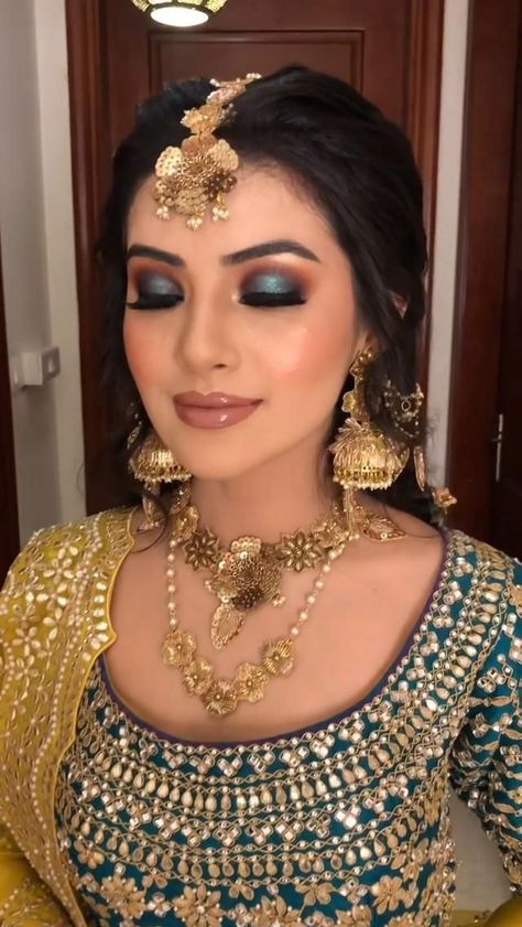 A colorful Mehndi look specifically concentrating on hooded eye makeup look. [Video] | Indian bride makeup, Latest bridal makeup, Bridal makeup images Bridal Makeup Ideas Indian, Non Bridal Makeup Indian, Haldi Mehendi Makeup Look, Sangeet Bridal Makeup Look, Dulhan Makeup Indian, Makeup By Parul Garg, Best Bridal Makeup Pakistani, Eye Makeup For Bride Indian, Makeup Ideas For Indian Wedding