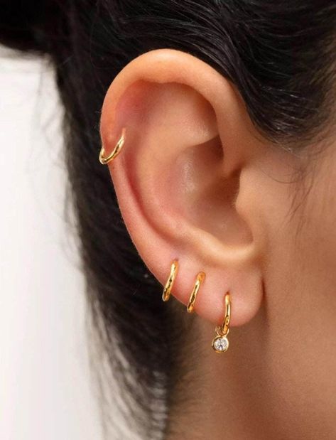 Our non tarnish gold vermeil CZ charm sleeper hoop earrings are the perfect everyday addition to your ears. Also choose from Sterling Silver too! ♥️ Real Gold-Plated Sterling Silver (Vermeil) Hoops ♥️ Choose your charm (heart or star) ♥️ Hypoallergenic ♥️ The perfect, everyday hoops ♥️ Choose your size ♥️ 1.2mm thickness ♥️ Small and Easy to put in ♥️ Free gift bag included, ready for gifting straightaway  This listing is for 1 hoop earring, if you need a pair please buy 2  For any more question Three Earlobe Piercings, 3rd Ear Piercing Ideas, 3 Hole Earring Ideas, 3 Lobe Piercings Ideas, Three Lobe Piercings, Triple Lobe Piercing, 3 Lobe Piercings, 4 Piercings, 3 Ear Piercings