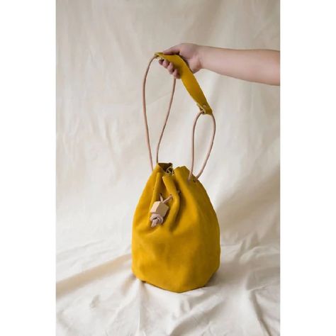 Bucket Bag – PoweredbyPeople Heritage Crafts, Wooden Cubes, Mini Bucket Bags, Mini Bucket, Yellow Mustard, Conscious Consumer, Wholesale Bags, Soft Suede, Drawstring Backpack