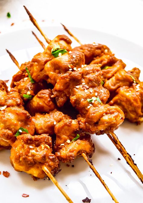 Chicken Satay Skewers with Peanut Sauce are a great easy chicken appetizer or main course bursting with flavor, but oh so simple. This easy peanut sauce recipe is the ultimate satay sauce for dipping, drizzling, marinating, and more! Peanut Chicken Skewers Recipe, Grilled Chicken Satay Skewers, Asian Chicken Skewers, Peanut Sauce Recipe Easy, Chicken Skewers With Peanut Sauce, Easy Chicken Satay With Peanut Sauce, Chicken Appetizers Easy, Chicken Satay Skewers, Chicken Satay Recipe