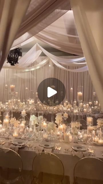 WedLuxe on Instagram: "Incoming: the most ANGELIC #reception reveal! 😱 All white flowers + moody candle light = the definition of ✨ethereal✨ This #weddingdesign WILL take your breath away! 

Planning & Concept Design: @lisikorn_signatureevents
Event Photographer: @bringmesomewherenice
Decor Photographer: @jessicariekephoto
Videographer: @rayromanfilms
Florals: @petalprod
Lighting, staging, and audio: @saleventsproductions
Rentals & Custom Pieces: @chromeeventfurnishing @nuagedesignsinc @differentlookrentals @soliskymiami @thelounge.rentals @unearthedrentals @themixdish
Candles: @lennoxandgracecandles
Kippot: @kippotworld
Desserts: @sweetguiltbyangelica
Cocktail Catering: @craftybrains
Entertainment: @elanartists" Melted Candles Wedding, Wedding With Candles, Candle Decor Wedding Reception Ideas, Candles Centerpiece Wedding, Candle Lit Wedding Reception Romantic, Candle Reception Decor, Small Wedding Reception, Candlelight Wedding Ceremony, Nigerian Wedding Reception