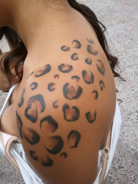 Leopard Print Neck Tattoo, Leopard Tattoo On Thigh, Cheetah Flower Tattoo, Lepord Print Tattoo Ideas, Cheetah Spots Tattoo, Leopard Print Shoulder Tattoo, Leopard Print Tattoos For Women, Leopard Print Arm Tattoo, Cheetah Shoulder Tattoo