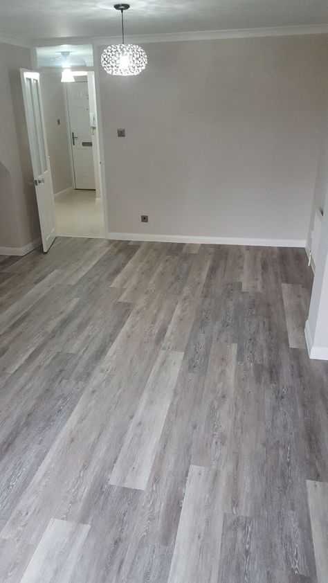 Grey Wood Flooring, Grey Laminate Flooring, Nautical Bedding, White Rattan, Grey Wood Floors, Tropical Ocean, Basement Makeover, Painted Walls, Grey Flooring