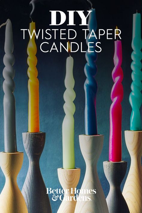 After a quick soak in hot water, it's easy to twist a plain taper candle into a sculptural piece of table decor. Create an inexpensive holiday centerpiece by grouping several candles together on a tray. Get creative when twisting and shaping your candles, the design options are endless. #twistedcandles #diytwistedcandles #diy #diyideas #bhg Christmas Tapered Candles, Taper Candle Making, Making Taper Candles, Decorating With Taper Candles, Taper Candle Crafts, Shaping Candles, Candle Stick Crafts, Painting Candles Diy, Diy Twisted Candles