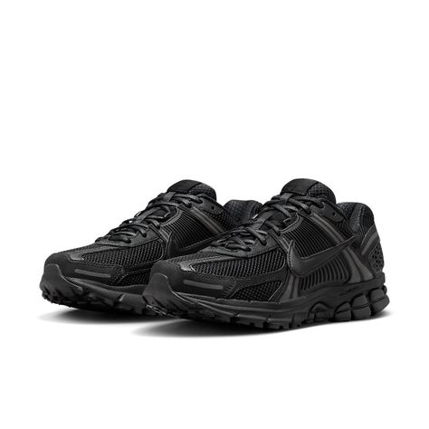 Introducing the Nike Zoom Vomero 5 "Triple Black" - a true stealth masterpiece. This inline release takes inspiration from the A-COLD-WALL collaboration, featuring a sleek all-black design with subtle grey overlays. While it shares similarities, it distinguishes itself with unique materials and a slightly lighter aesthetic. Get ready to embrace the darkness in style. Nike Zoom Vomero 5, Nike Vomero, Zoom Vomero 5, Vomero 5, Nike Models, Triple Black, Air Zoom, Early 2000s, Nike Air Zoom