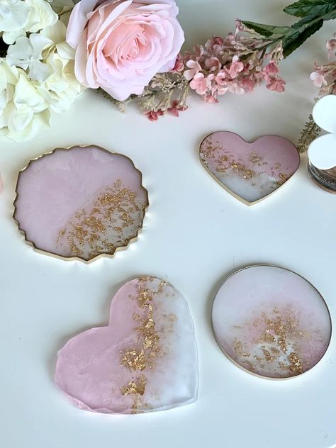 Add a touch of elegance to your home decor with these stunning soft pink resin coasters. Handmade with care and attention to detail, these coasters are perfect for protecting your furniture while adding a beautiful pop of color. Each set comes with four coasters, making it the perfect gift for yourself or a loved one. Don't wait any longer to elevate your living space! Check out our Etsy store for more handmade home decor items. Click the link in the pin to shop now! Cute Resin Coasters, Pink Resin Coasters, Pastel Resin Coasters, Rose Petal Resin Coaster, Resin Coasters Floral, Diy Resin Crafts, Handmade Home Decor, Resin Diy, Home Decor Items