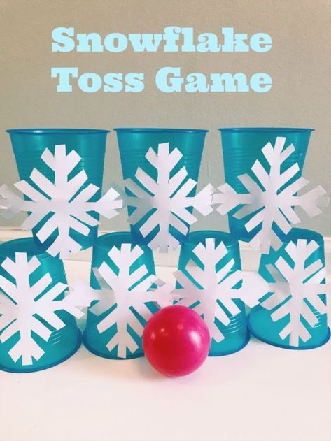 Winter Carnival Crafts, Snowflake Games For Kids, Winter Class Party Games, Snowflake Games, Snowflake Game, 1st Grade Winter Party, Snowball Toss Game, Ball Toss Game, Snowball Toss