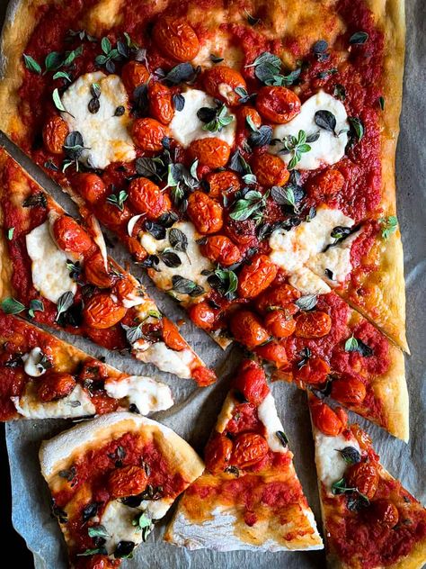 Sliced up pizza with red sauce, tomatoes and herbs. Cherry Tomato Pizza Sauce, Cherry Tomato Pizza, Gourmet Pizza Recipes, Tomato Pizza Sauce, Red Pizza, Store Bought Pizza Dough, Tomato Pizza, Vegan Pizza Recipe, Easy Vegan Dessert