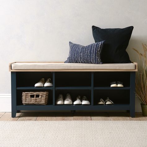 Are you forever tripping over shoes casually discarded in your hallway? Well, we have the answer in the form of this handsome and practical bench. Skilfully crafted along clean lines and painted chic midnight blue to go with just about any décor and draw admiring glances from visitors to your home, it has six handy cubby holes to keep your footwear organised and together. And above, there is a contrasting waxed and lacquered oak and premium oak veneer top with a padded cushion to provide you wit Diy Shoe Storage Bench Entryway, Hall Shoe Storage Bench, Wooden Shoe Storage Bench, Show Bench, Extra Wide Shoe Bench, Blue Shoe Bench, Shoe Rack With Cushion, Dark Wood Shoe Bench, Entry Floor