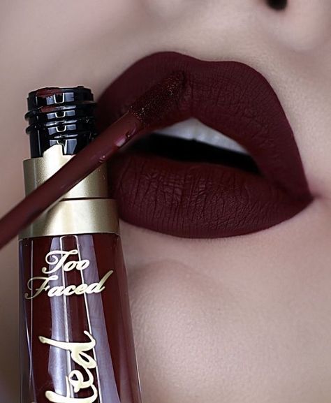 LONG-WEARING | NON-DRYING | DOE FOOT APPLICATOR Shade: Belladonna Be bold with a showstopping pout! This lightweight satin-matte lip color features a deluxe hydrating formula and provides extreme color payoff in one saturated swipe. mob wife makeup mob wife nails cute things to make classic hybrid lashes Maquillage Kylie Jenner, Makeup Lips Matte, Maroon Lipstick, Mac Lipstick Shades, Lipstick Dark Red, Matte Lipstick Shades, Orange Lips, Lipstick Kit, Beautiful Lipstick