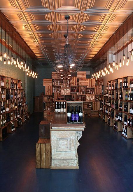 Great design for a new wine & liquor boutique, 56 Degrees, in Brooklyn.  see more photos: http://56degrees.wix.com/liquorstore#!ABOUT/c786 Boutique Liquor Store, Wine Shop Interior Design Liquor Store, Liquor Store Design Interiors, Wine Boutique Shops, Wine Store Design, Wine Shop Interior, Wine Bar Design, Wine Cubes, Craft Beer Shop