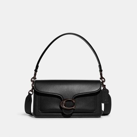 A modern take on an archival 1970s Coach design our structured Tabby shoulder bag is crafted of polished pebble leather. Finished with our Signature hardware for an iconic touch the compact 26 features two detachable straps to carry by hand style as a short shoulder bag or wear crossbody. | Coach Tabby Shoulder Bag 26 - Women's - Pewter/black Small Coach Purse, Coach Bag Black, Coach Black Bag, Mini Coach Bag, Coach Tabby Black, Coach Purse Outfit, Hachi Komatsu, Black Designer Bag, Coach Tabby Bag