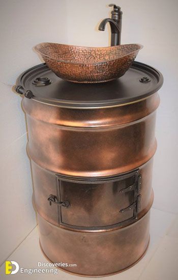 Barrel Metal Drum Project Ideas!!! - Engineering Discoveries Dry Flush Toilet, Metal Barrel Furniture, Industrial Sink, Barrel Sink, Leaking Toilet, Oil Rubbed Bronze Faucet, Used Oil, Oil Rubbed Bronze Bathroom, Copper Sink Bathroom