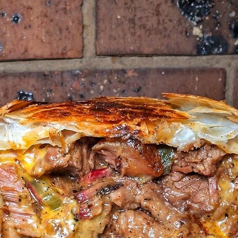 Matthew Bromage on Instagram: "Brisket, jalapeno, pickle and cheese PIE   What do you do with leftover brisket?  For me, it's either chilli or pies   Basic recipe   Chop up brisket, make a gravy (I just use Maggi Gravy Classic Rich mix)   Combine gravy and chopped brisket, add sliced pickles and jalapenos   Warm in a pan until all thoroughly mixed  Add diced cheese (hi-melt cheese works a treat)   Then whether you use puff pastry or short crust, it's up to you   I use puff pastry and a deep dish pie maker   Then cut your pastry, lay the pastry in the pie maker, fill with your mixture, another layer of pastry and shut the lid   Cook till golden brown   These were absolutely delicious, with a nice little kick!  #boomasbbq #barbecue #barbeque #bbq  #melbourne #australia #lowandslow #grilling Brisket Puff Pastry, Brisket Jalapeño Pot Pie, Brisket Jalapeno Cheese Pie, Brisket Jalapeño And Cheese Pot Pie, Brisket Pot Pie, Brisket Pie, Pickle And Cheese, Sliced Pickles, Beef Chilli