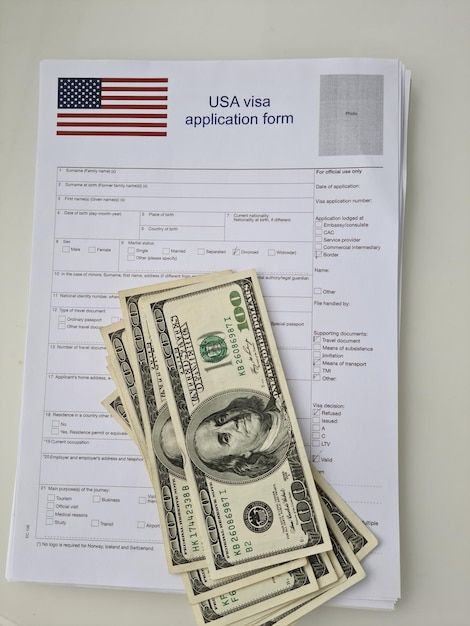 American visa application form and cash ... | Premium Photo #Freepik #photo #visa-approved #embassy #visa-stamp #visa-application Us Money, Visa Approved, Visa Format For Yahoo, Visa Application, Visa Picture, American Visa Approved, Us Visa Approved, Visa Application Form, Canada Visa Approved