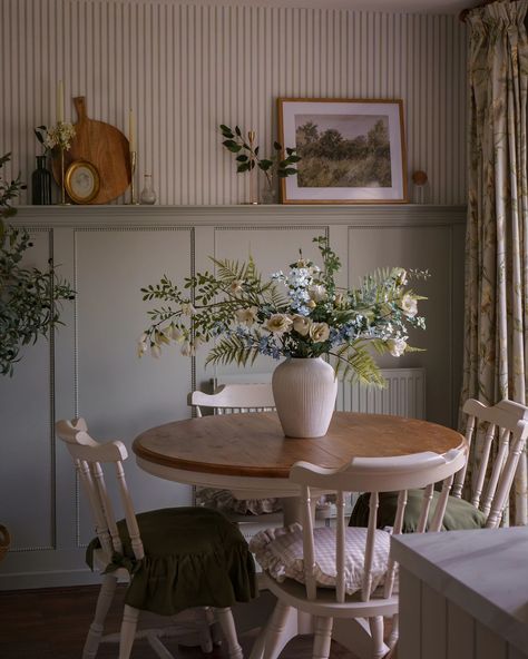 Country style dining kitchen ➡️ swipe for the before and save for dining room inspo ✨️ This is what our dining room looks like today, photo snapped this afternoon in the low autumn light. We added shaker wall panelling, striped wallpaper, bobbin trim, a shelf, and upcycled farmhouse style kitchen table to add some country style character to this space. The next image is when we moved in, we just added what we had and made it work for a long time before decorating. Ironically I loved this c... Cottage Core Dining Room, Shaker Wall Panelling, Cottagecore Dining Room, Dining Room Paneling, Farmhouse Style Kitchen Table, Dining Room Inspo, Vintage Kitchen Table, Antique Dining Room, Shaker Wall